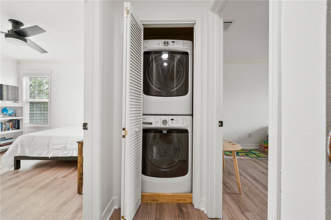 2 Schendel Road Portland, TX 78374 - Photo 30 of 39 a view of a hallway with washer and dryer