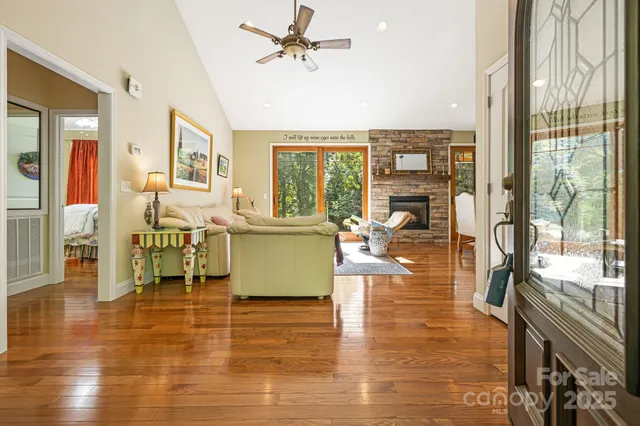 a view of a living room and hardwood floor