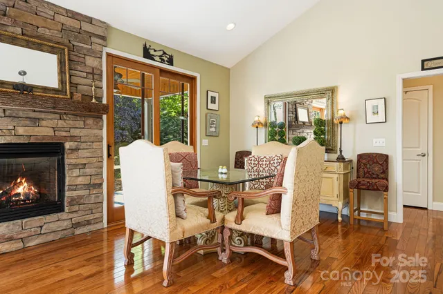 a view of a livingroom with furniture and a fireplace