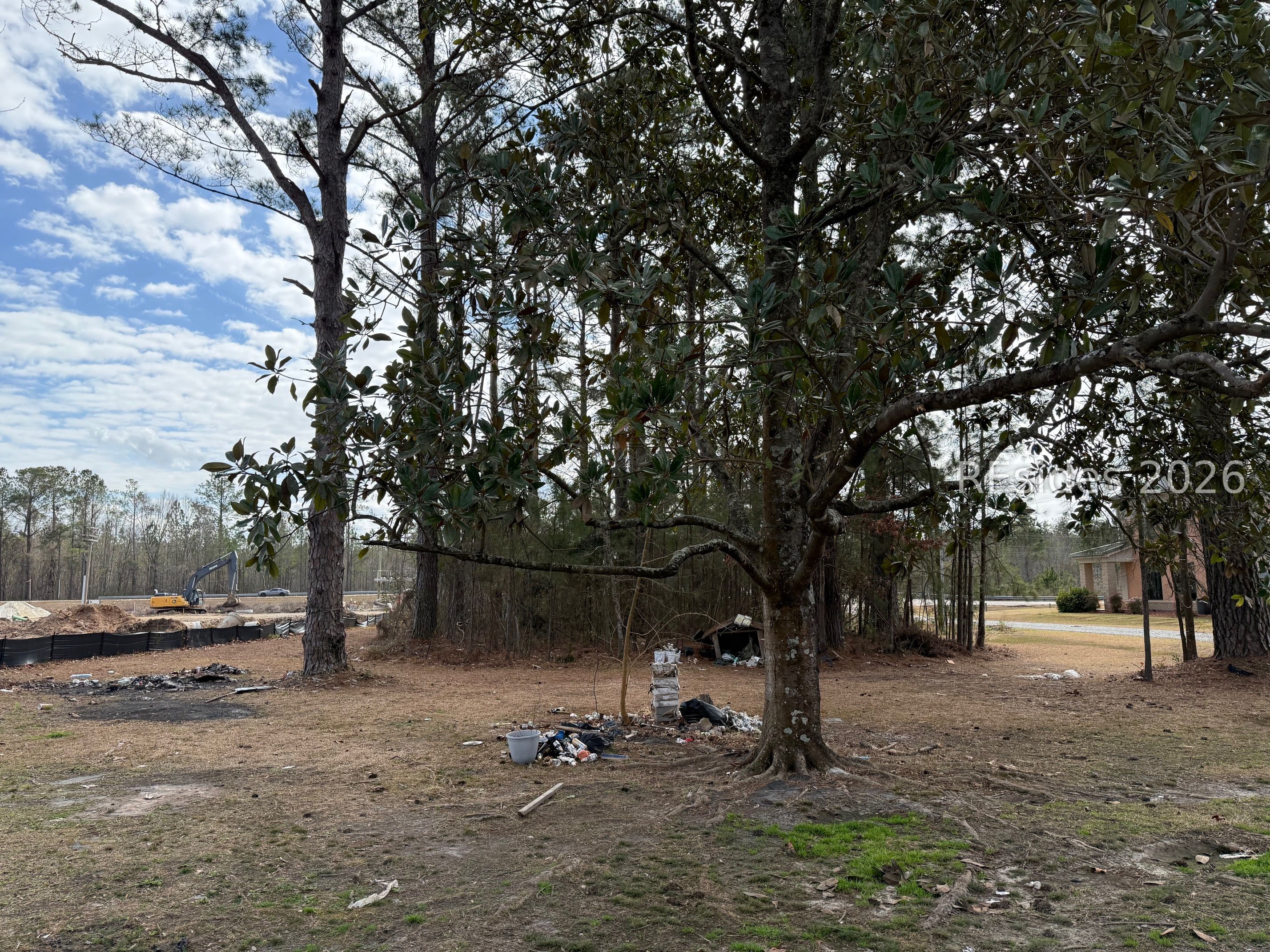 58 Brickyard Pointe Hardeeville, SC 29927 - Photo 4 of 13 Front of lot facing Hwy 278 - trees blocking 278