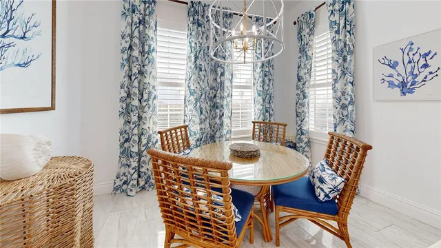 a bedroom with a bed and a chair