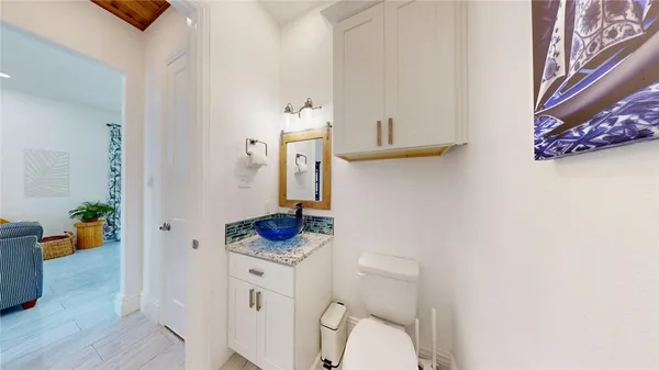 a bathroom with a toilet and a sink