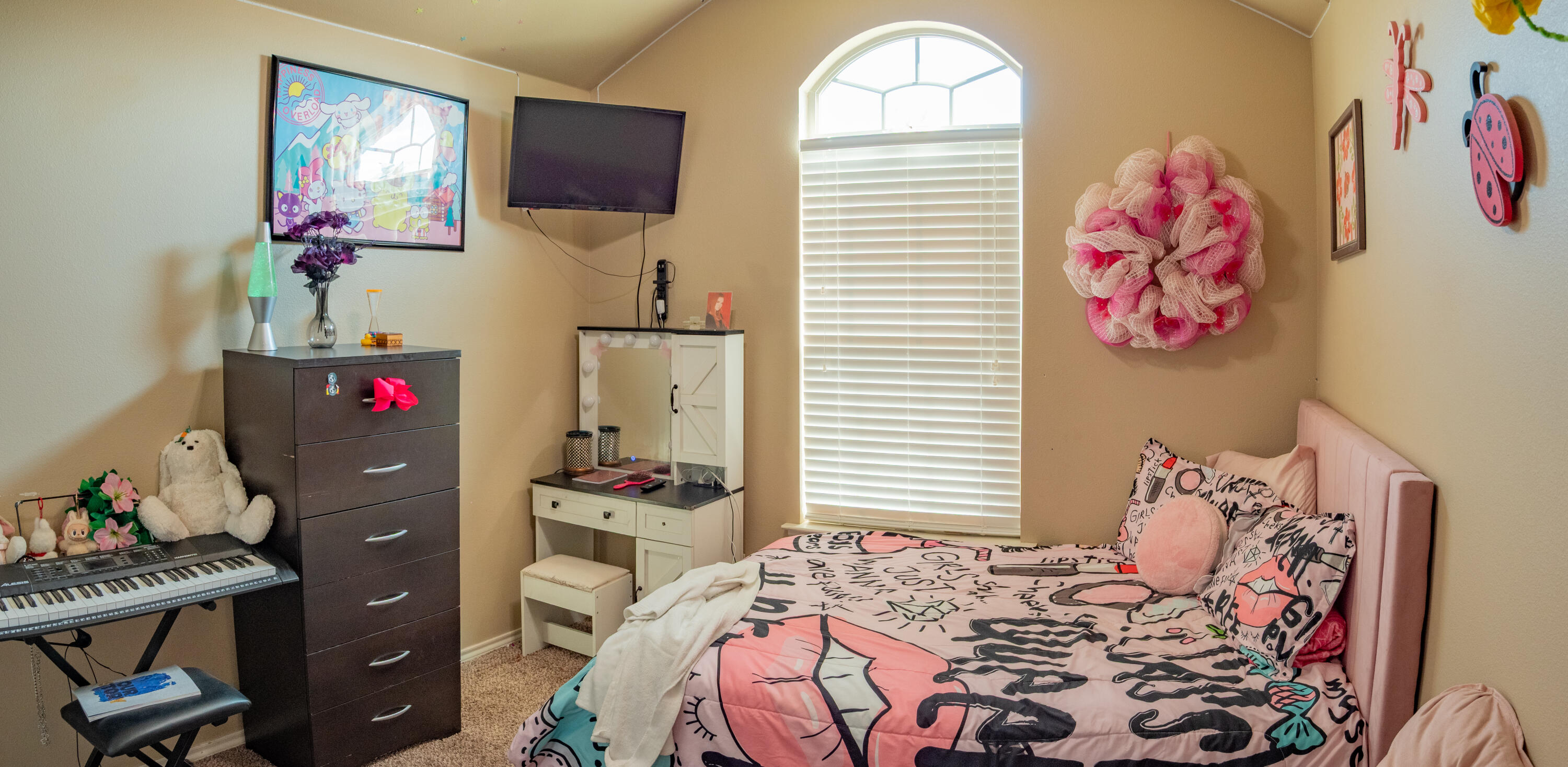 910 12th Street Wolfforth, TX 79382 - Photo 16 of 18 a bedroom with a bed and furniture