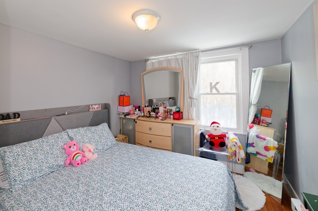 10 Rhubena Street Framingham, MA 01702 - Photo 22 of 30 a bed room with a bed and a window