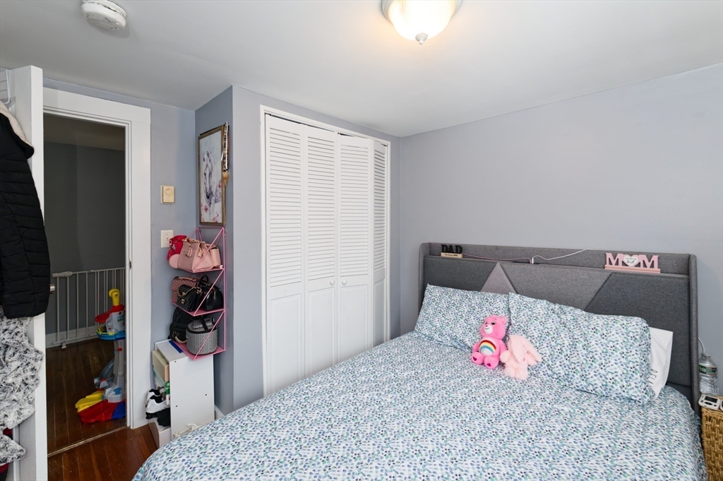 10 Rhubena Street Framingham, MA 01702 - Photo 23 of 30 a bedroom with a bed and a closet