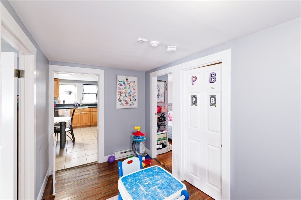 10 Rhubena Street Framingham, MA 01702 - Photo 26 of 30 a view of workspace with wooden floor and furniture in wooden floor