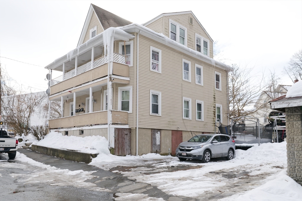 10 Rhubena Street Framingham, MA 01702 - Photo 29 of 30 a view of a car park in front of a building
