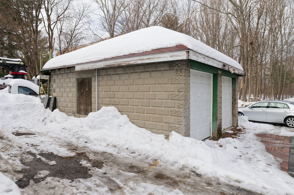 10 Rhubena Street Framingham, MA 01702 - Photo 30 of 30 a view of a house with a snow on the road