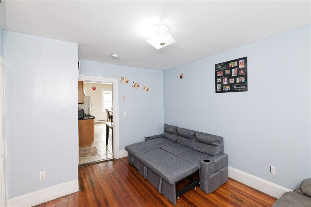 10 Rhubena Street Framingham, MA 01702 - Photo 4 of 30 a living room with wooden floor and furniture