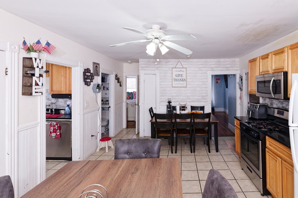 10 Rhubena Street Framingham, MA 01702 - Photo 10 of 30 a dining room with furniture and wooden floor