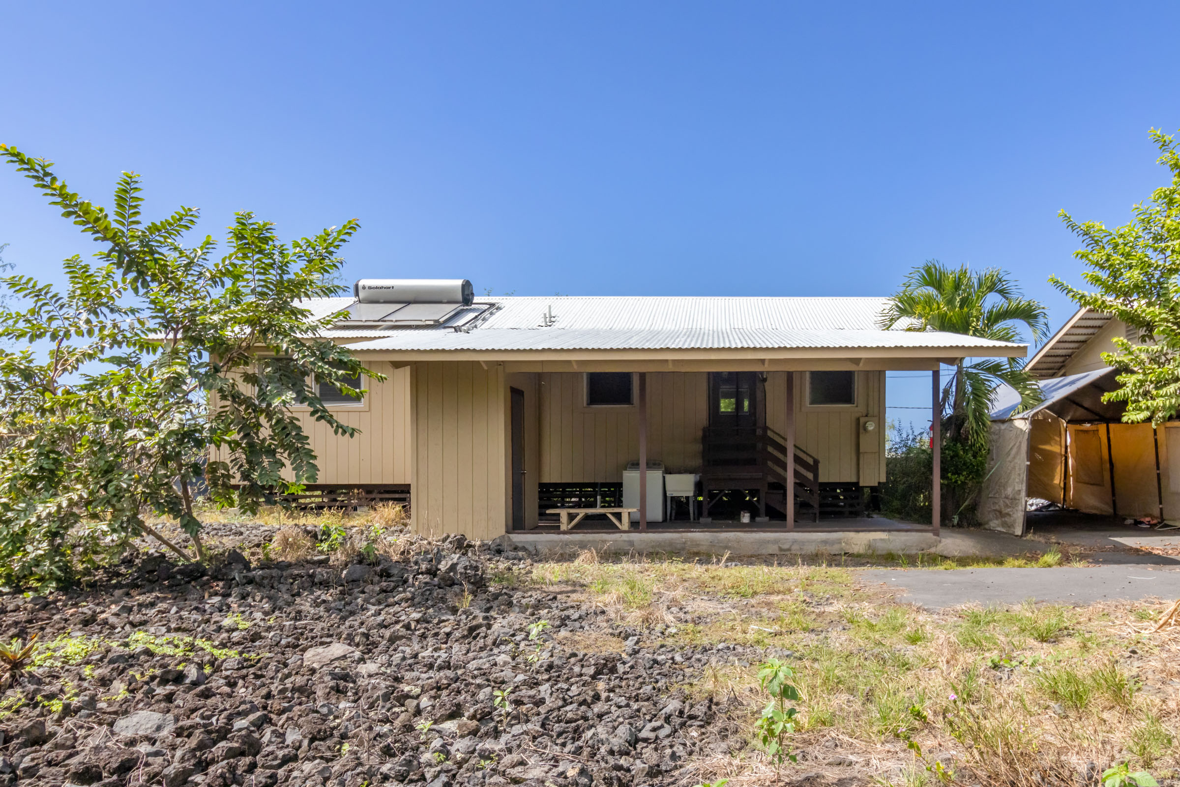 82-1097 Meli Road Captain Cook, HI 96704 - Photo 13 of 23 a front view of house with a yard