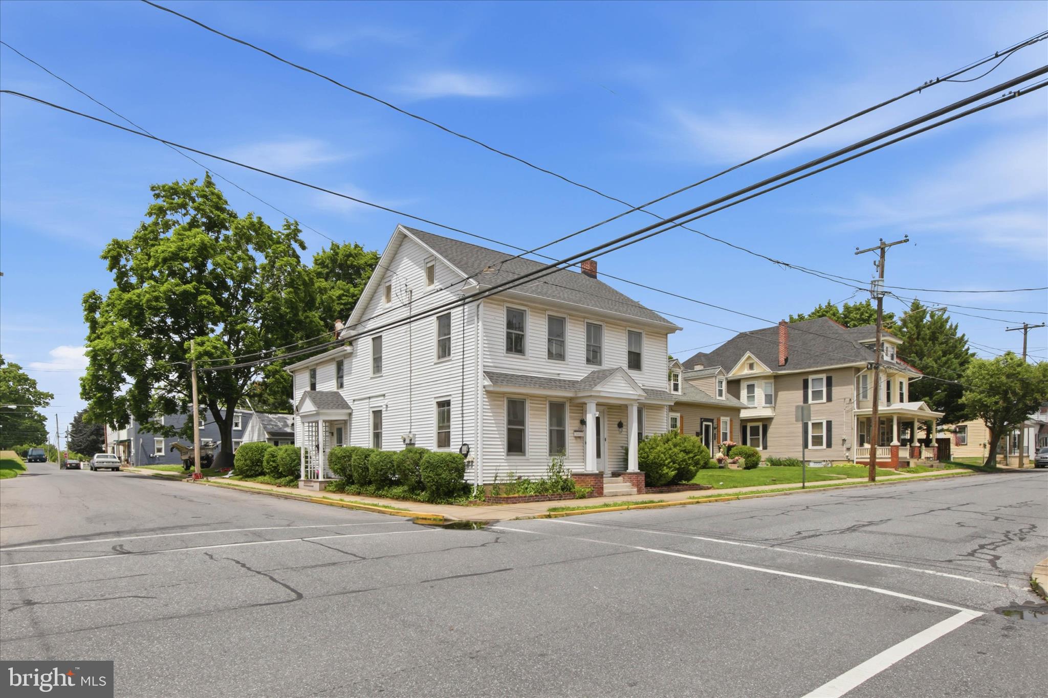 101 East Lincoln Avenue Lititz, PA 17543 - Photo 2 of 39 a front view of a house with a garden