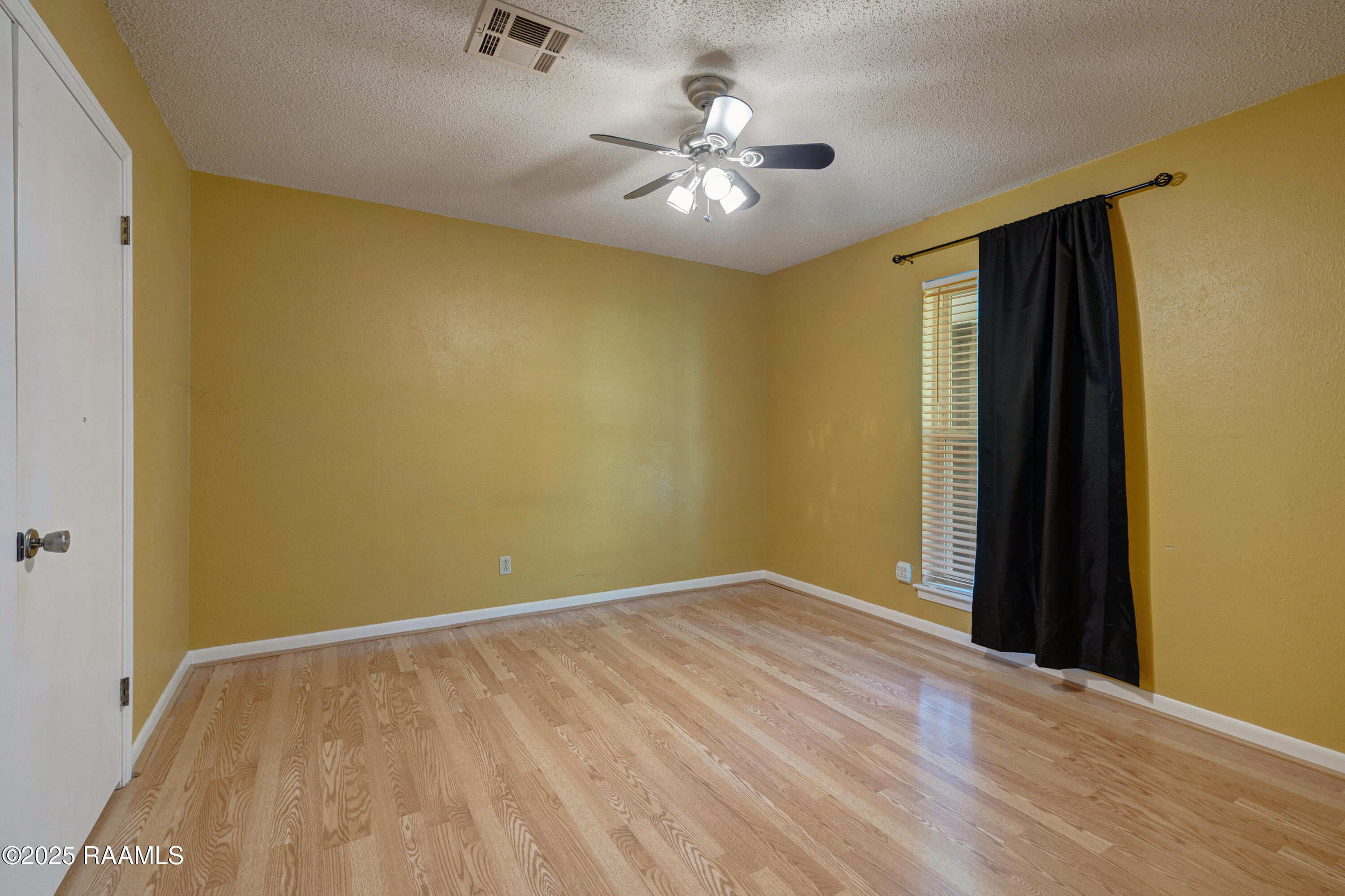303 Estainville Avenue Lafayette, LA 70508 - Photo 12 of 22 Guest Bedroom 1