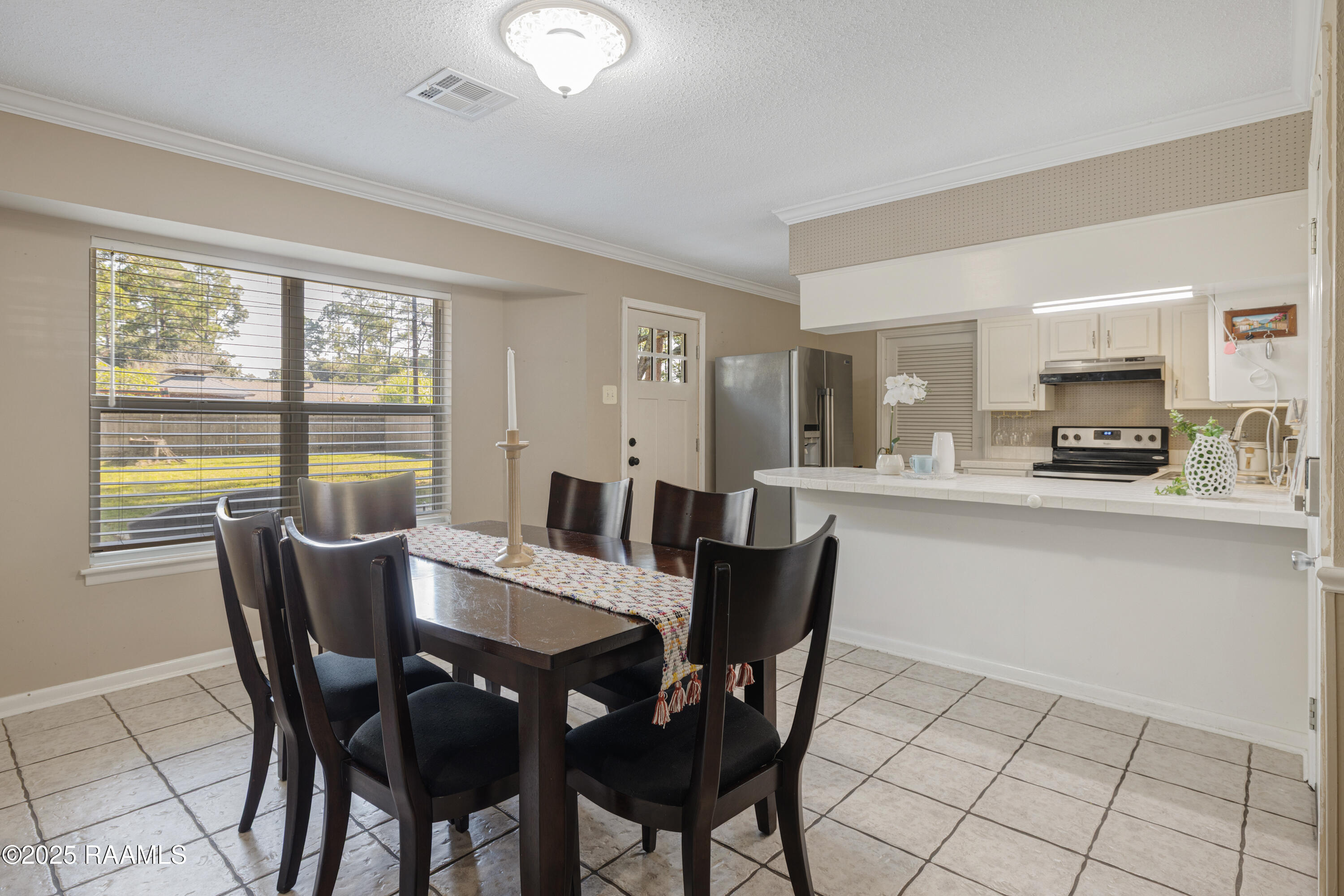 303 Estainville Avenue Lafayette, LA 70508 - Photo 8 of 22 Dining Room adjacent to Kitchen
