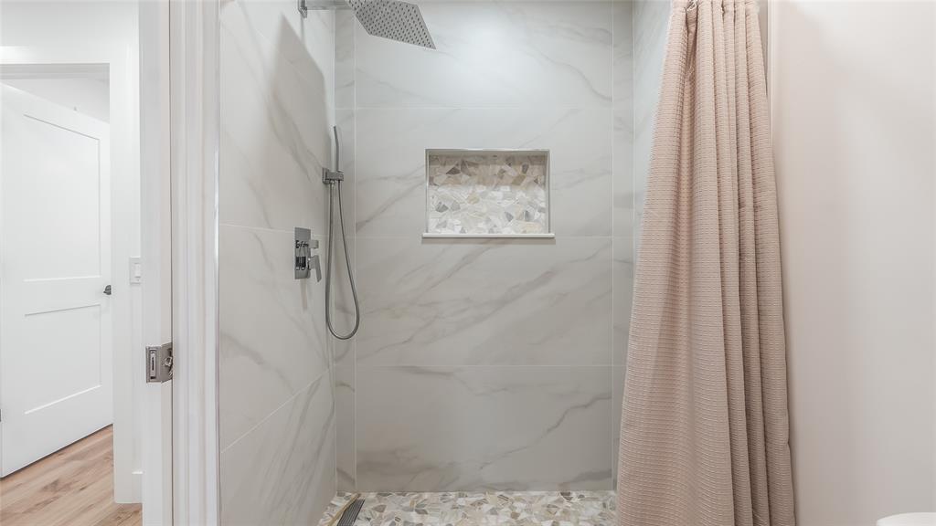 1399 West Camino Real Boca Raton, FL 33486 - Photo 22 of 45 a bathroom with a shower