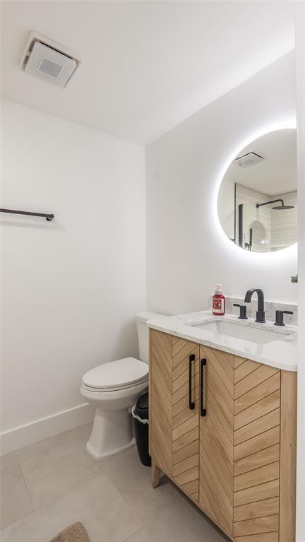 1399 West Camino Real Boca Raton, FL 33486 - Photo 26 of 45 a bathroom with a sink and a toilet