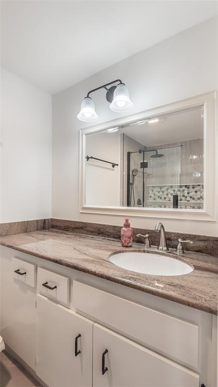 1399 West Camino Real Boca Raton, FL 33486 - Photo 29 of 45 a bathroom with a sink and a mirror