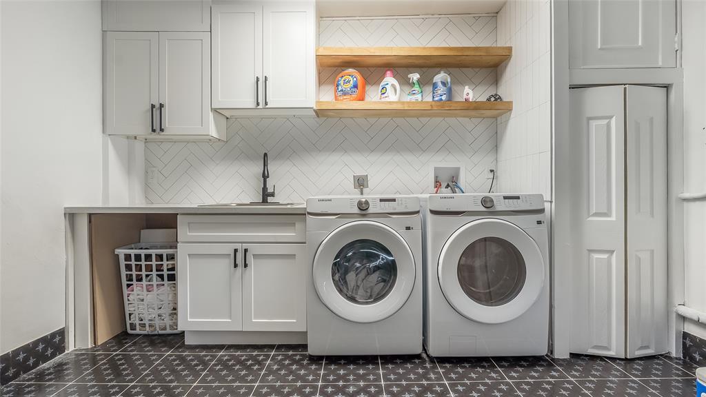 1399 West Camino Real Boca Raton, FL 33486 - Photo 36 of 45 a utility room with stainless steel appliances washer and dryer