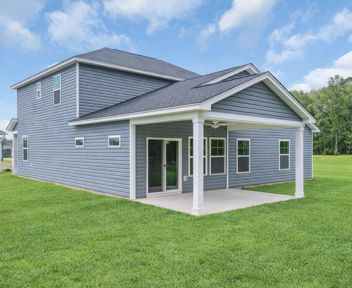 162 Westfield Circle Conway, SC 29526 - Photo 27 of 31 Back of house with a patio, a ceiling fan, a lawn, and a shingled roof