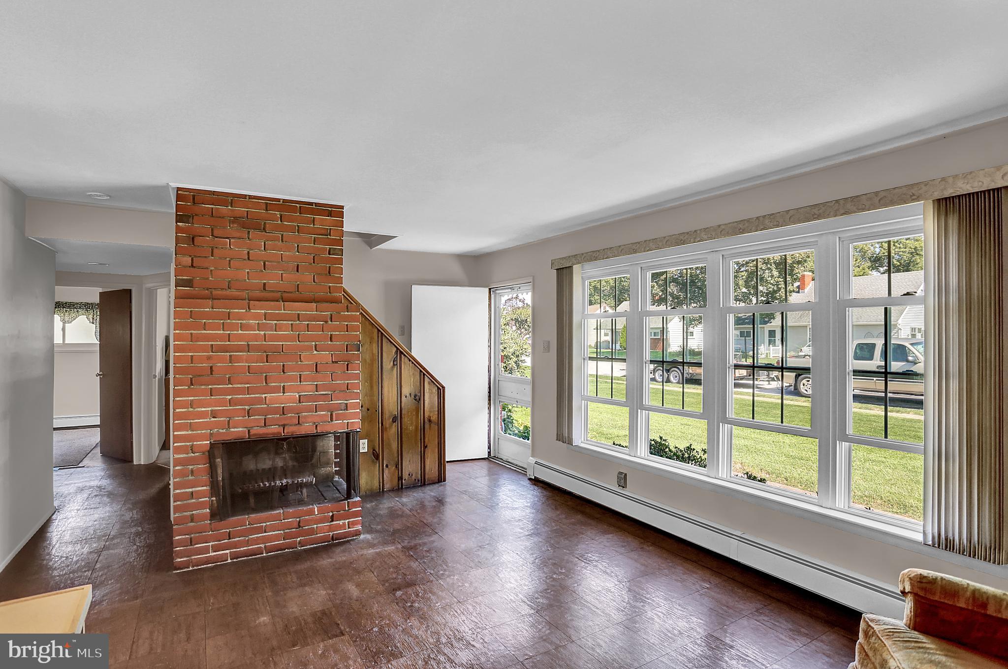1508 Continental Road York, PA 17404 - Photo 6 of 37 Living room with wood fireplace