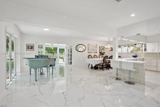a living room with furniture and a table