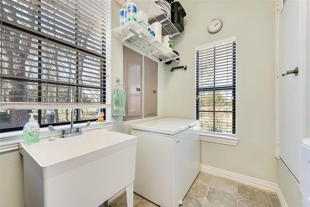 a view of a balcony with furniture