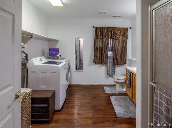 a hallway with a washer and dryer