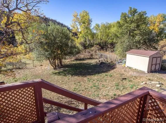 a view of a backyard with a trees