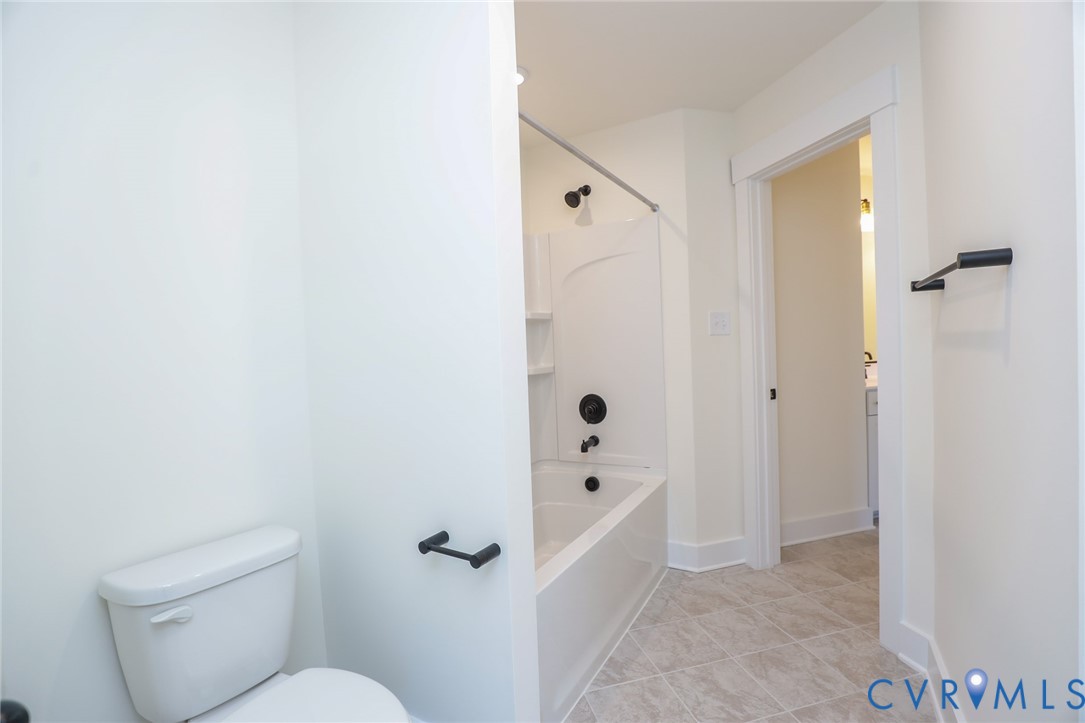 12320 Coalboro Road Chesterfield, VA 23838 - Photo 11 of 15 a bathroom with a toilet and shower