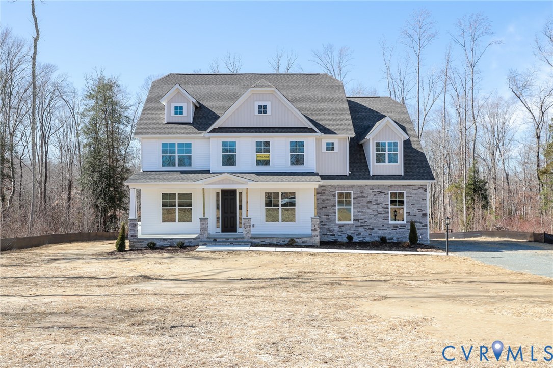 12320 Coalboro Road Chesterfield, VA 23838 - Photo 2 of 15 a front view of a house with a garden
