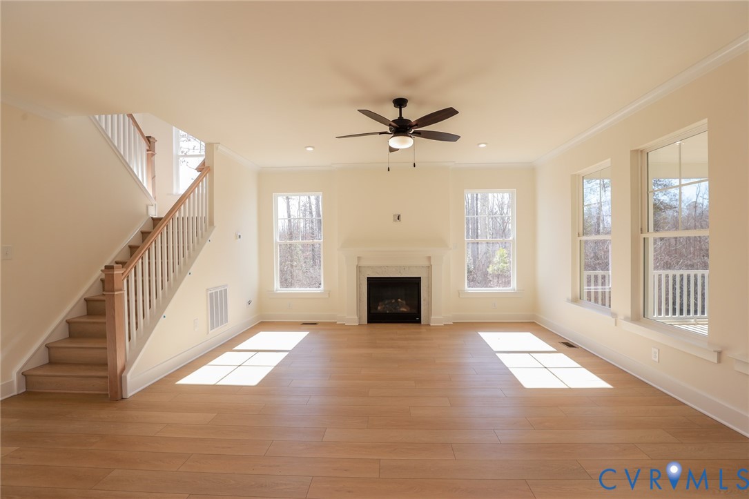 12320 Coalboro Road Chesterfield, VA 23838 - Photo 9 of 15 a view of an empty room with fireplace and a window