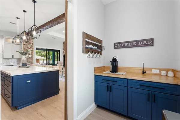 a bathroom with a double vanity sink mirror and bathtub