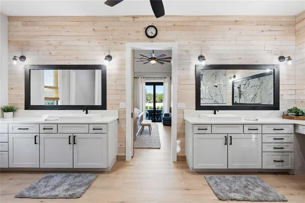 an aerial view of a house with swimming pool garden and patio