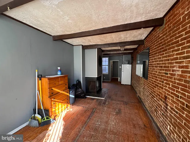 a view of swimming pool with a patio