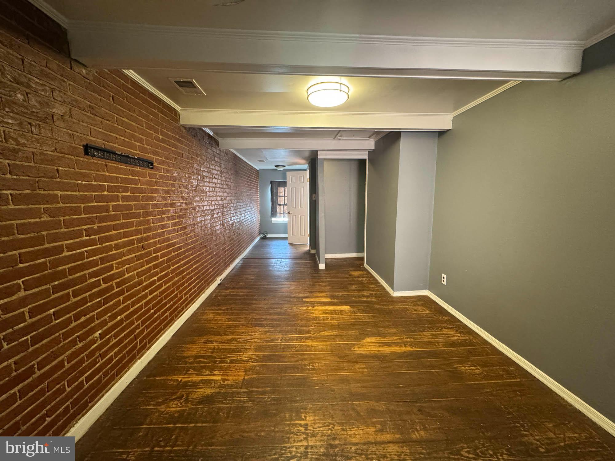 703 Tessier Street Baltimore, MD 21201 - Photo 9 of 11 a view of a backyard