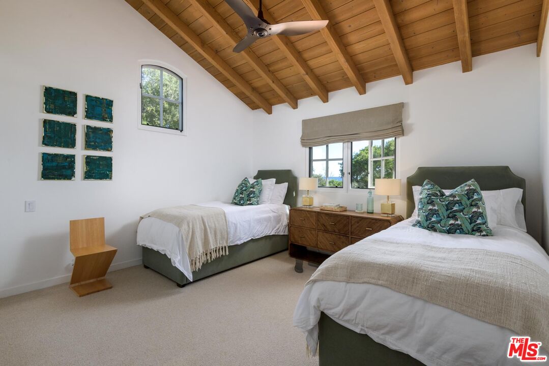 849 Ashley Road Montecito, CA 93108 - Photo 18 of 28 a bedroom with two beds and a window