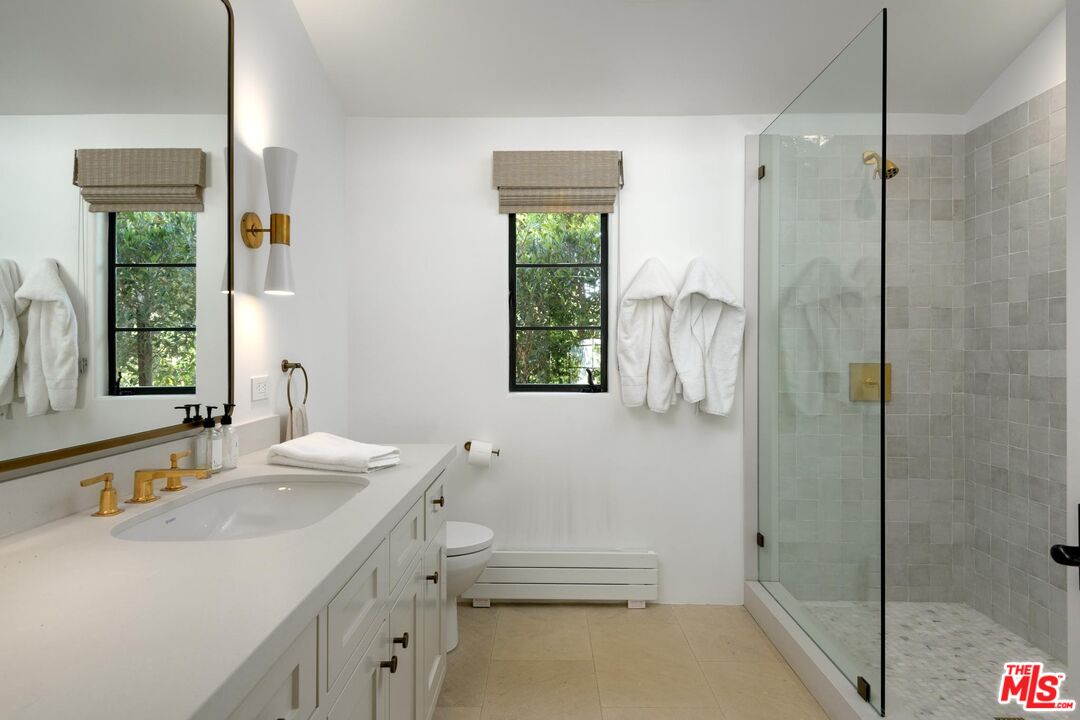 849 Ashley Road Montecito, CA 93108 - Photo 24 of 28 a bathroom with a sink a toilet and shower