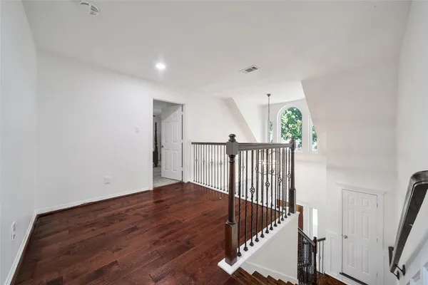 a view of entryway with wooden floor