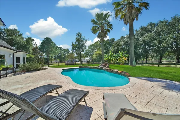 a view of outdoor space yard swimming pool and patio