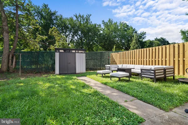a garden view with a seating space