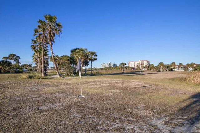 a view of house with outdoor space and swimming pool