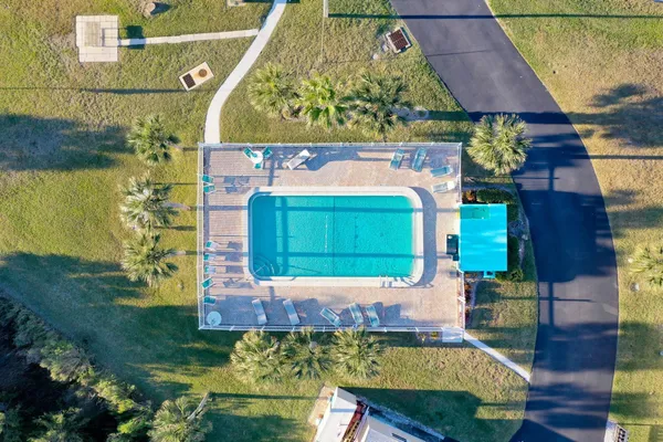 an aerial view of a pool