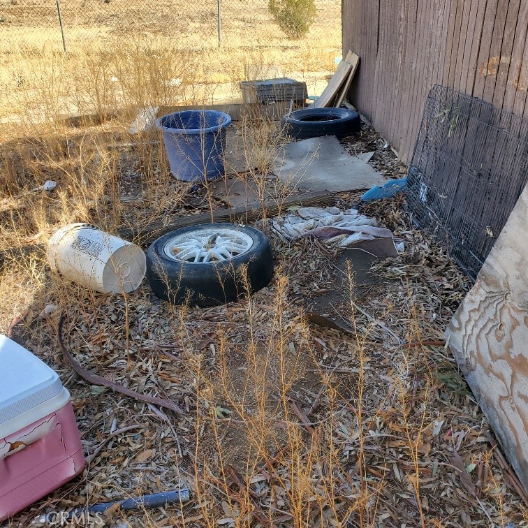 843 Sky Place Ridgecrest, CA 93555 - Photo 17 of 19 a view of a backyard with table and chairs