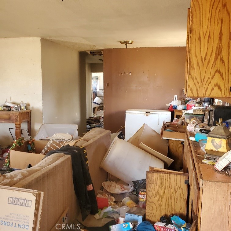 843 Sky Place Ridgecrest, CA 93555 - Photo 8 of 19 a bed room with a bed and a couch