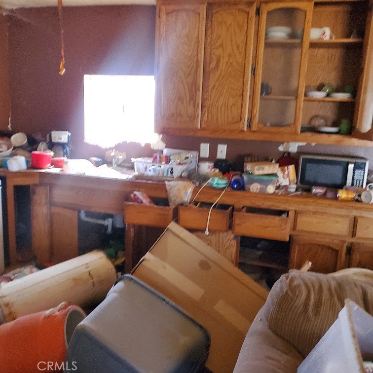 843 Sky Place Ridgecrest, CA 93555 - Photo 9 of 19 a room with furniture and a window