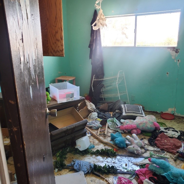843 Sky Place Ridgecrest, CA 93555 - Photo 10 of 19 a bathroom with a sink toilet and a window