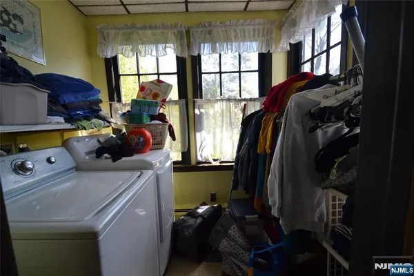 a kitchen with a window a sink and a stove