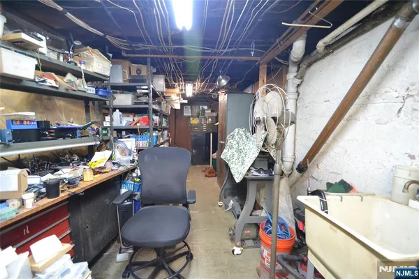 a view of a workspace with furniture