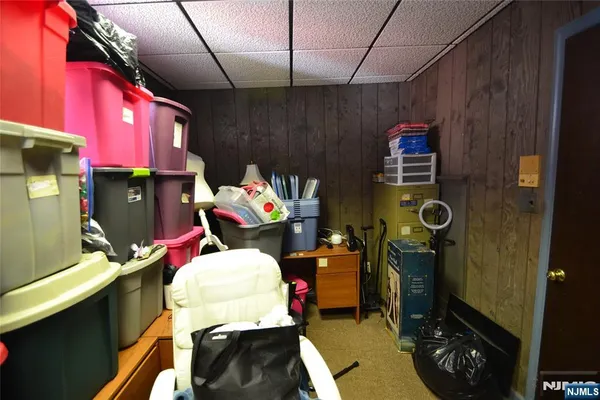 a bathroom with a sink mirror vanity and toilet