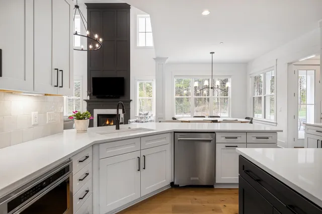 a white bath tub sitting in a bathroom